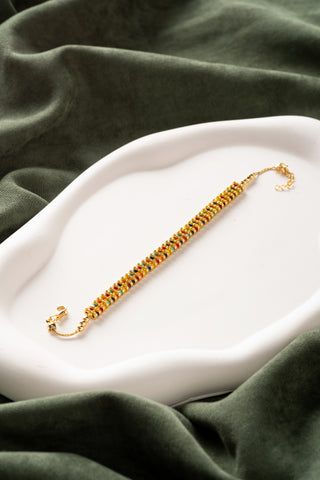 Gold bracelet with coloured stones